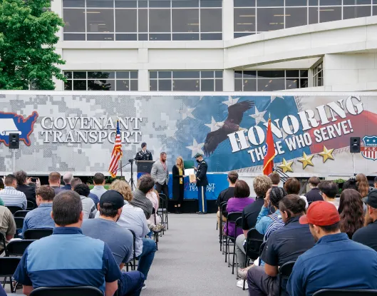 A veteran giving a speech at a gathering to honor those who serve