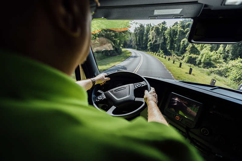 Trucker driving on open road