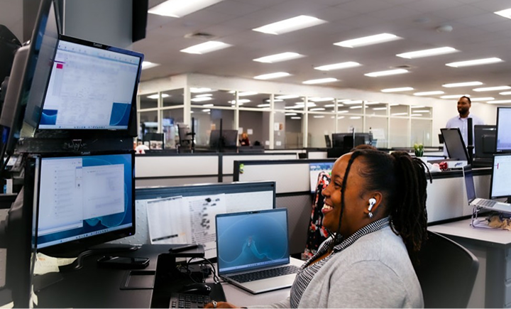 A Star Logistics brokerage team member working at her desk