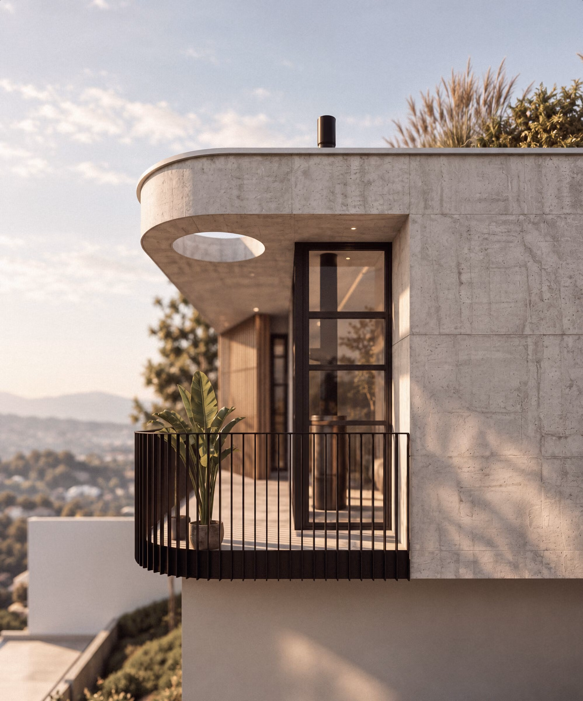 Curved off-shutter concrete balcony with a black steel balustrade