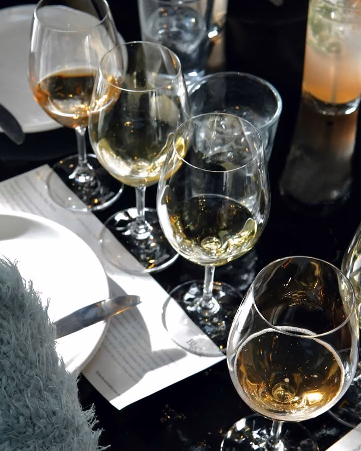 Glasses of white wine at dinner