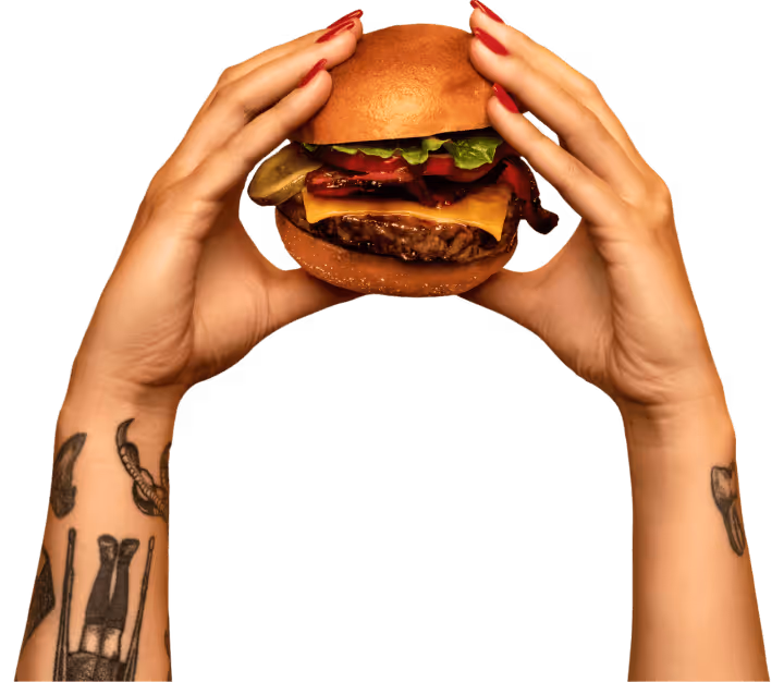 hands holding burger