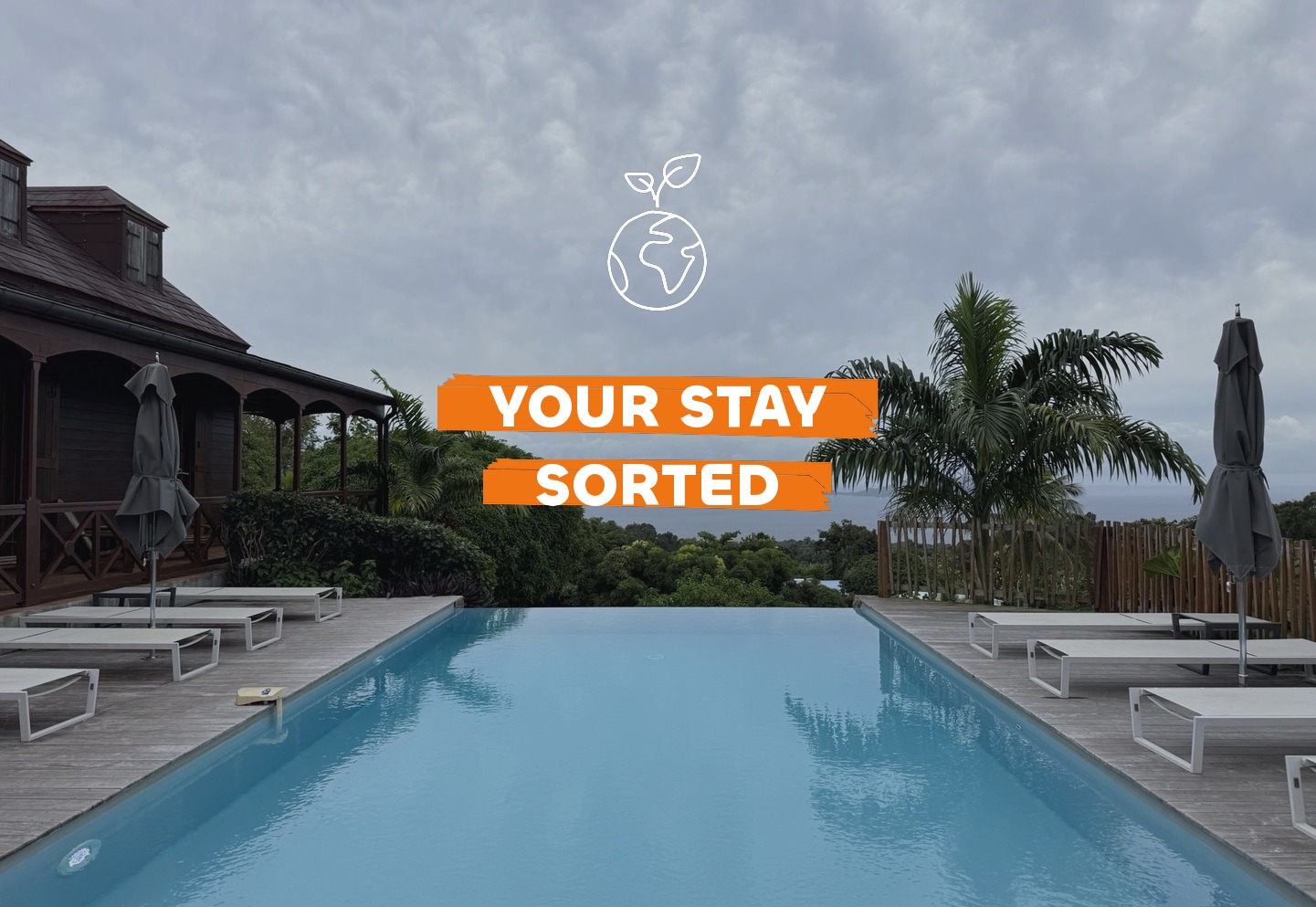 Tropical eco-lodge terrace overlooking Guadeloupe rainforest and bay, where to stay in Guadeloupe , Travel Differently
