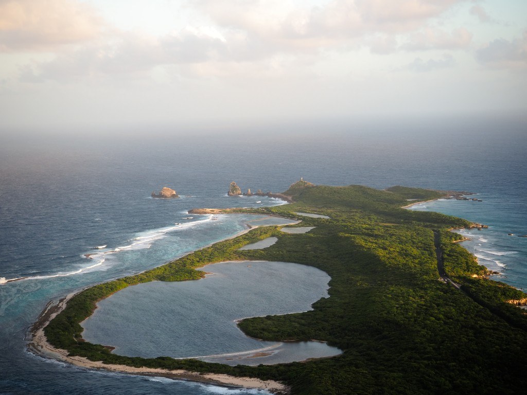 Pointe des Châteaux peninsula aerial view Guadeloupe Travel Differently December 2025