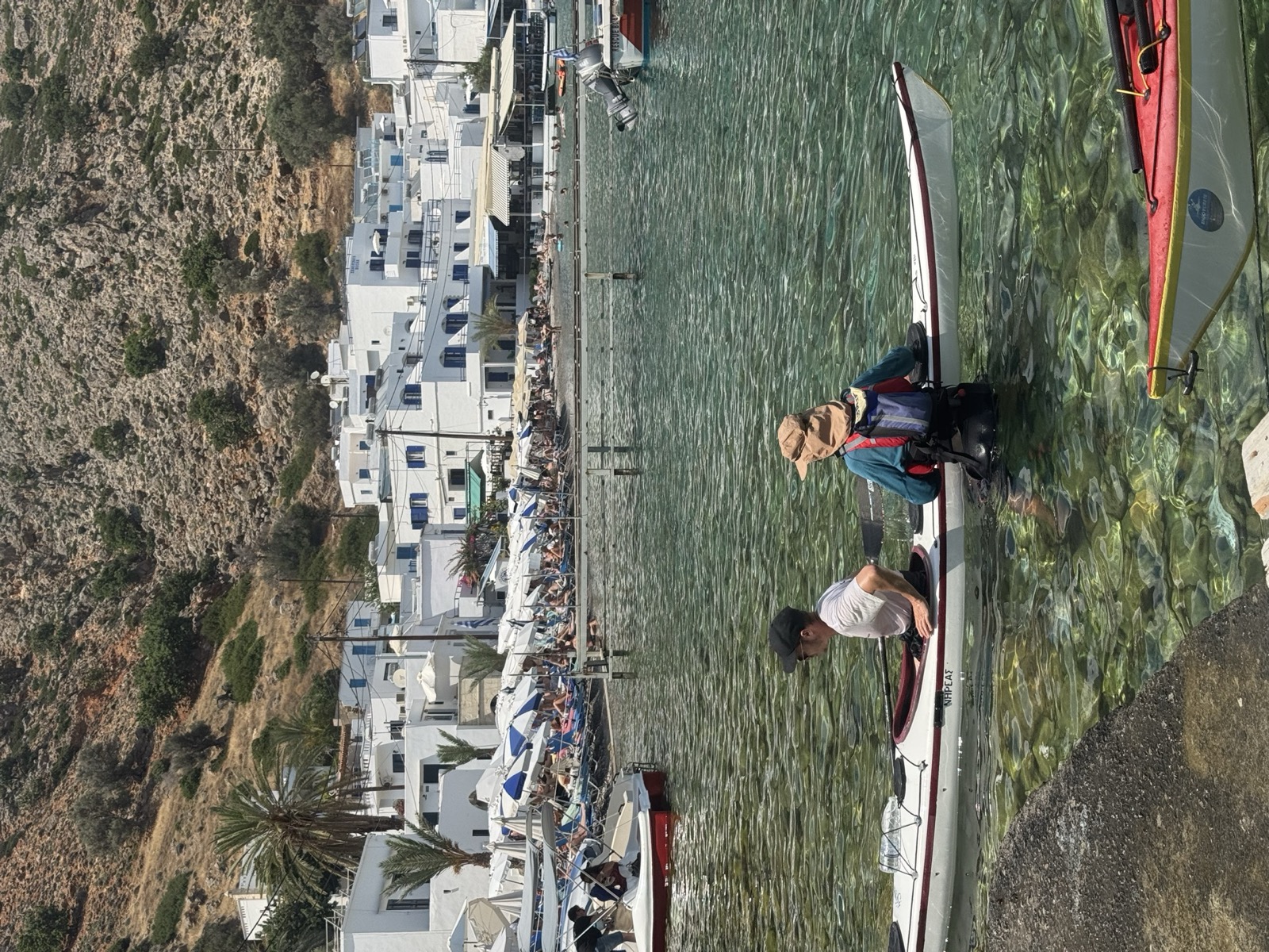 Paddling a tandem sea kayak into Loutro harbour, south Crete