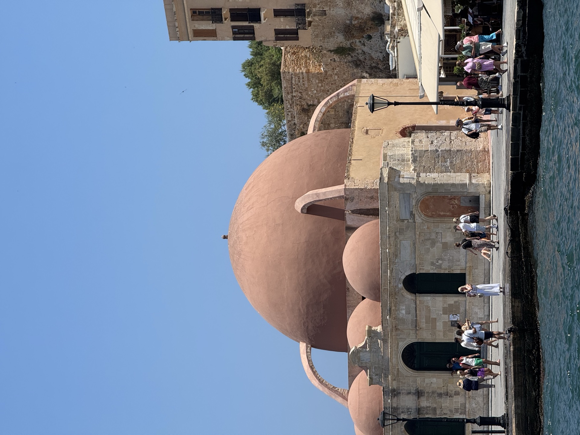 Kucuk Hasan mosque domes on the Venetian harbour of Chania