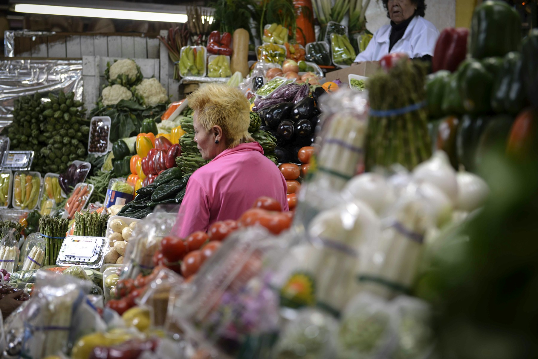 Colorful fruit and vegetable market display in Latin America, Spanish travel vocabulary, Travel Differently