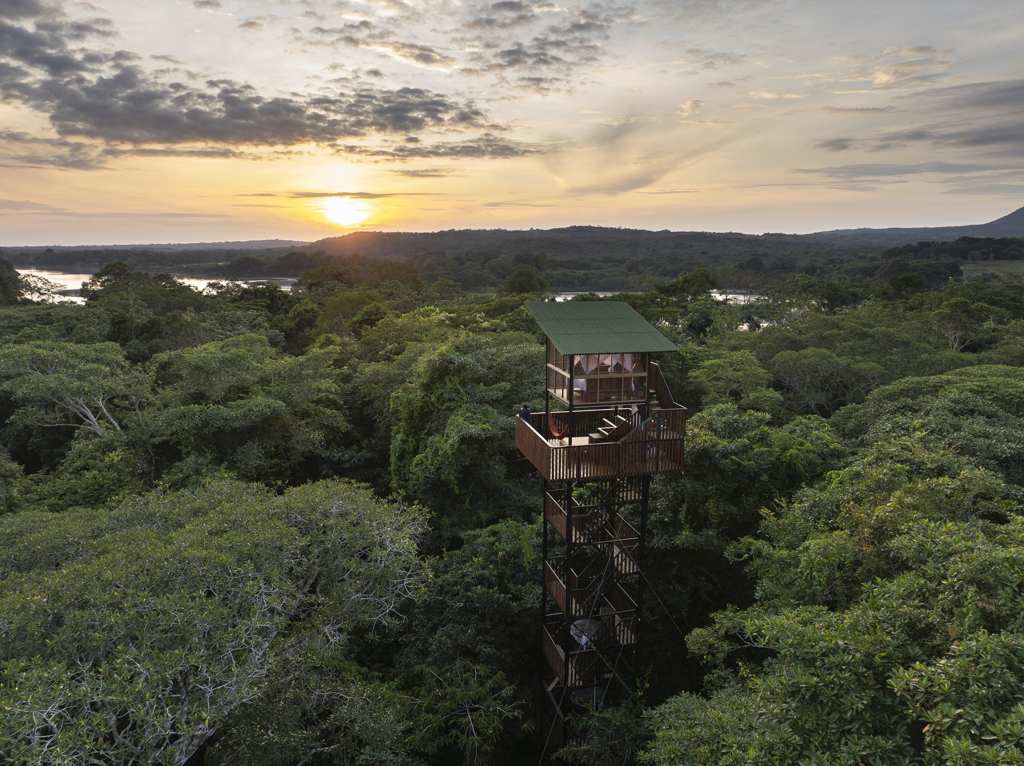 Canopy cabin tower above the jungle at sunset, La Manigua Lodge