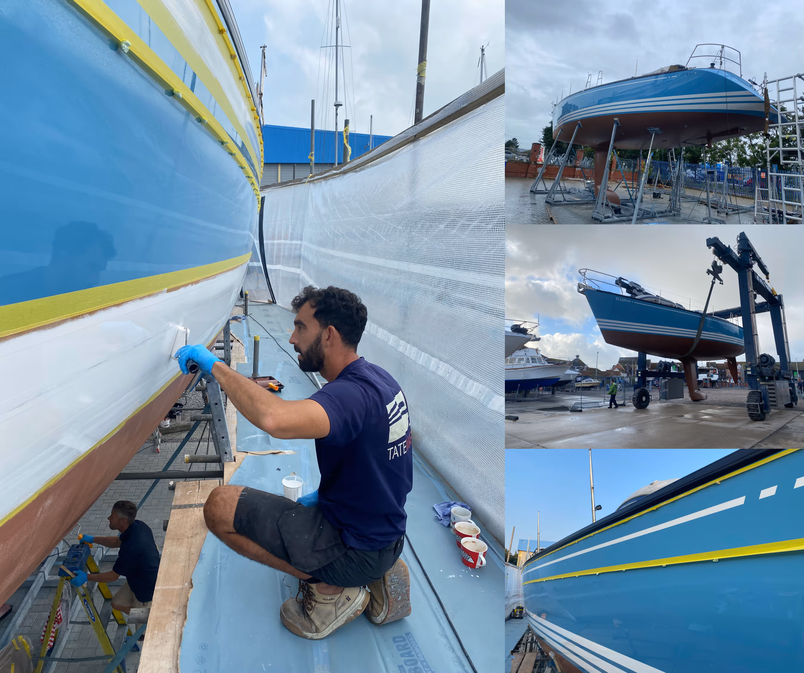 Man carefully painting a blue and white sailboat in a boatyard.