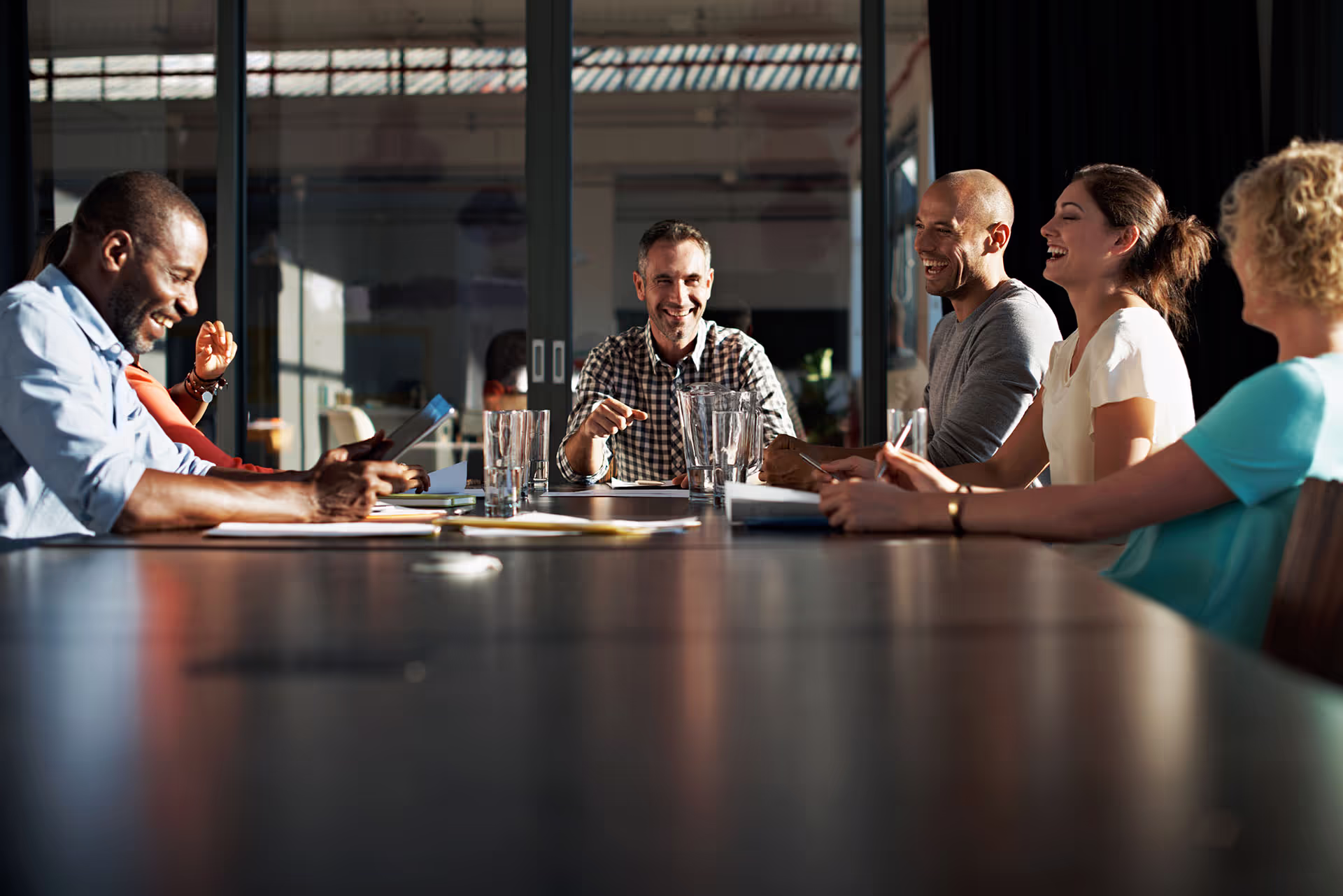 Tablet displaying the website of Dr. Maura McKeown & Associates, sitting atop of a wooden stool.