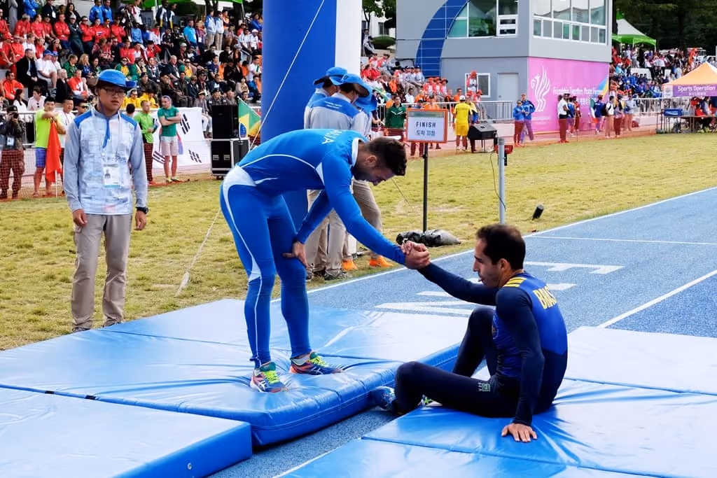Athletes displaying sportsmanship to each other