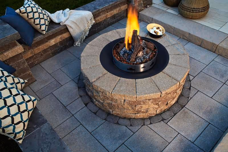 round fire pit with wood logs