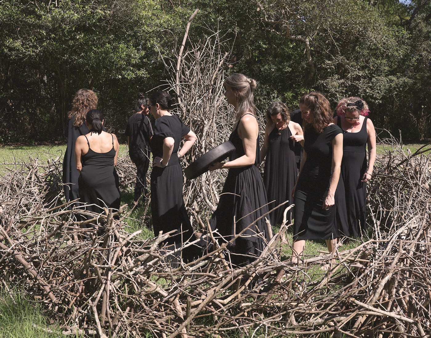 At the closing of Deering Contemporary 2026: Here We Gather, Rebecca White and companions carried out a ritual within her installation La Guía. Designed to connect body and spirit with the Four Directions, and suffused with a live sonic landscape by Emily Peters (an Artist in Residence at Deering Estate), the performance was an invocation for the highest good of the Collective. Keening, a mourning practice shared among Gaelic-speaking people, was commonly seen in Ireland and Scotland up until the middle of the 20th century when it fell out of favor with the Church. Certain women offered ecstatic wailing cries during burials, which gave community members permission to release their own pent-up emotion and honor their loved ones. This modern-day Keening was intended to facilitate catharsis of collective rage, grief, and despair at the current state of our country. 