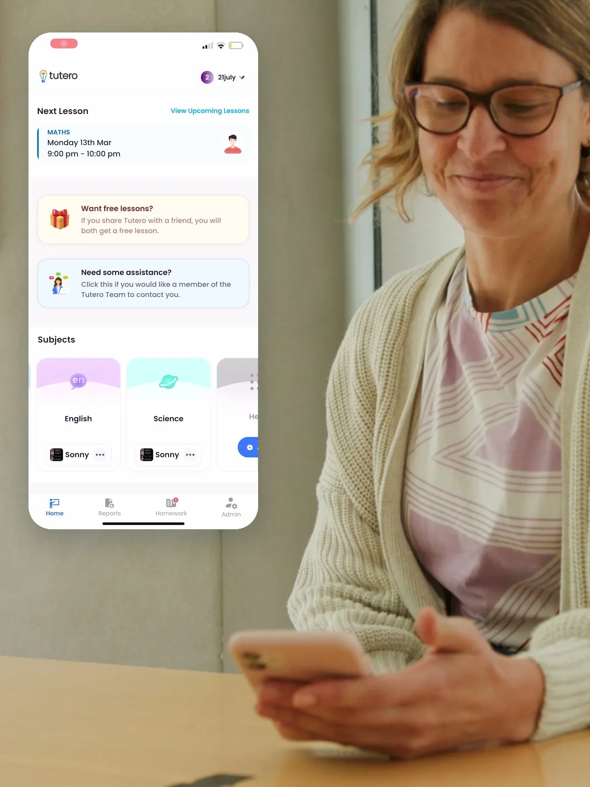 A parent on her phone, with the Tutero parent app open beside her
