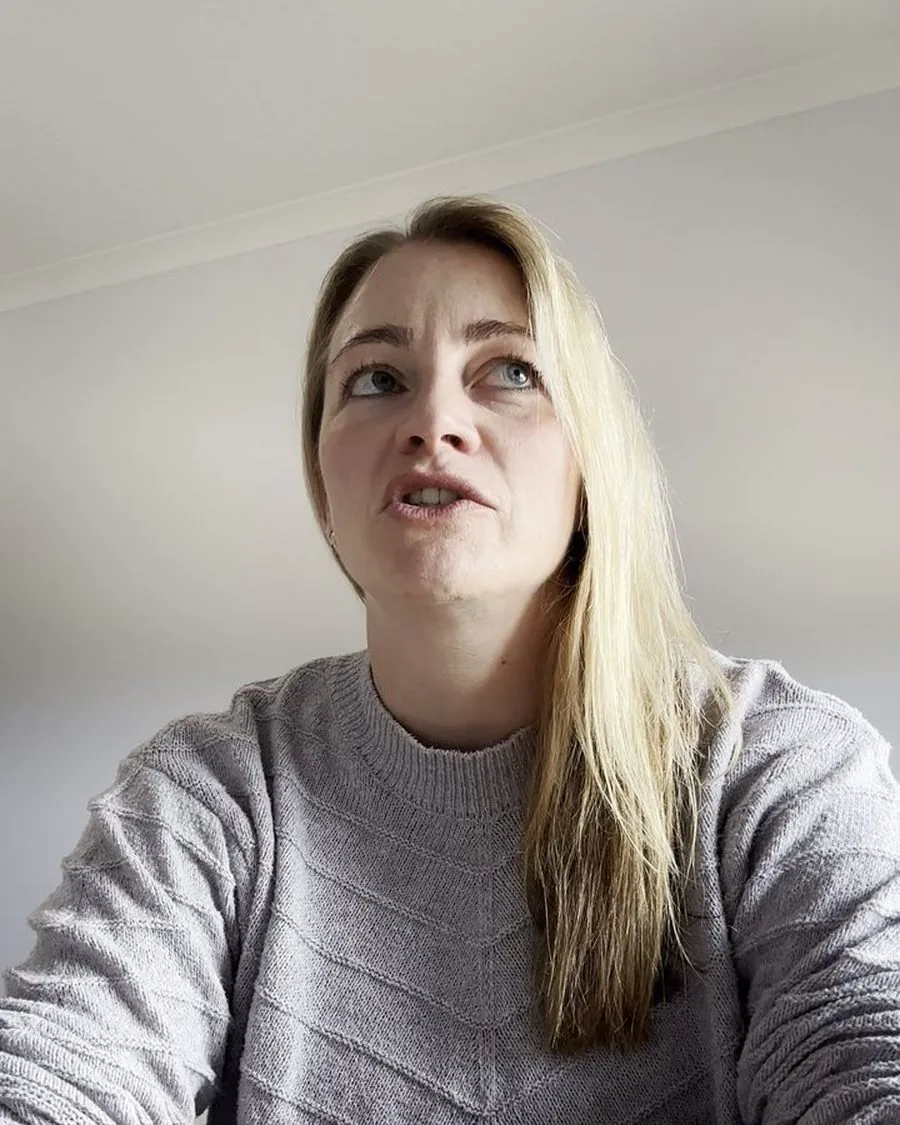 Jayne in a grey knit sweater, mid-sentence, talking about finding a chemistry tutor from rural Tasmania