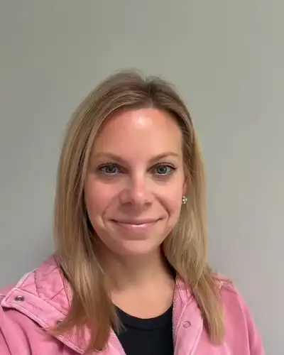 Lauren, Tutero account manager, waving