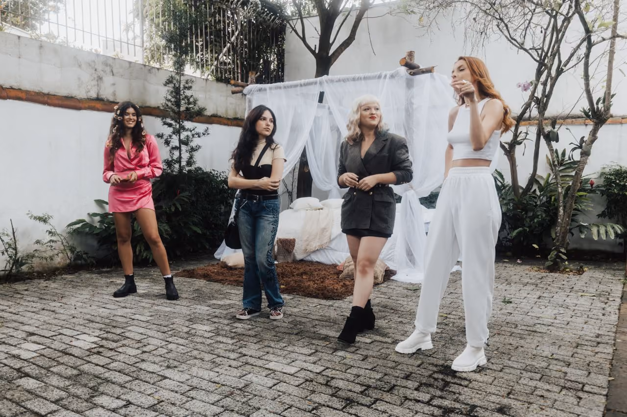 group of women modeling different wholesale fashion items 