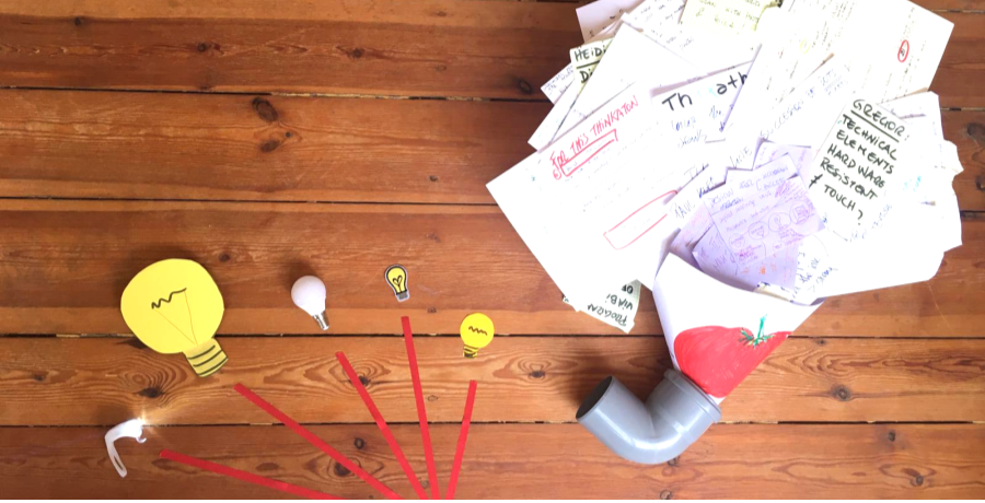 papers in a funnel and 5 representations of lightbolbs coming out