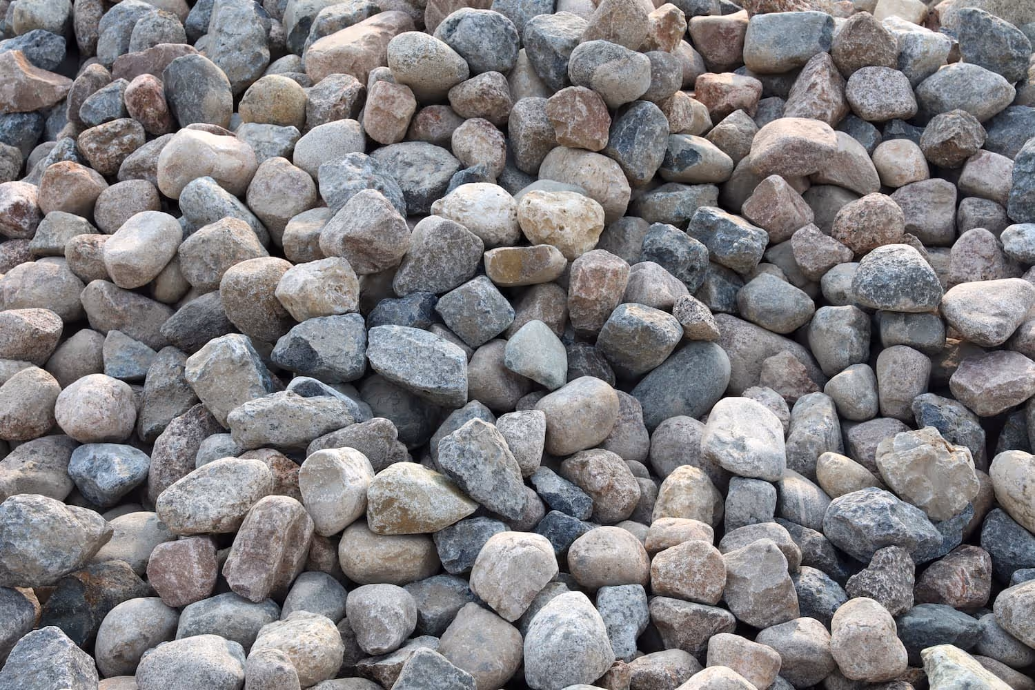 Granite 4" - 8" (River Jacks) spread out on the ground