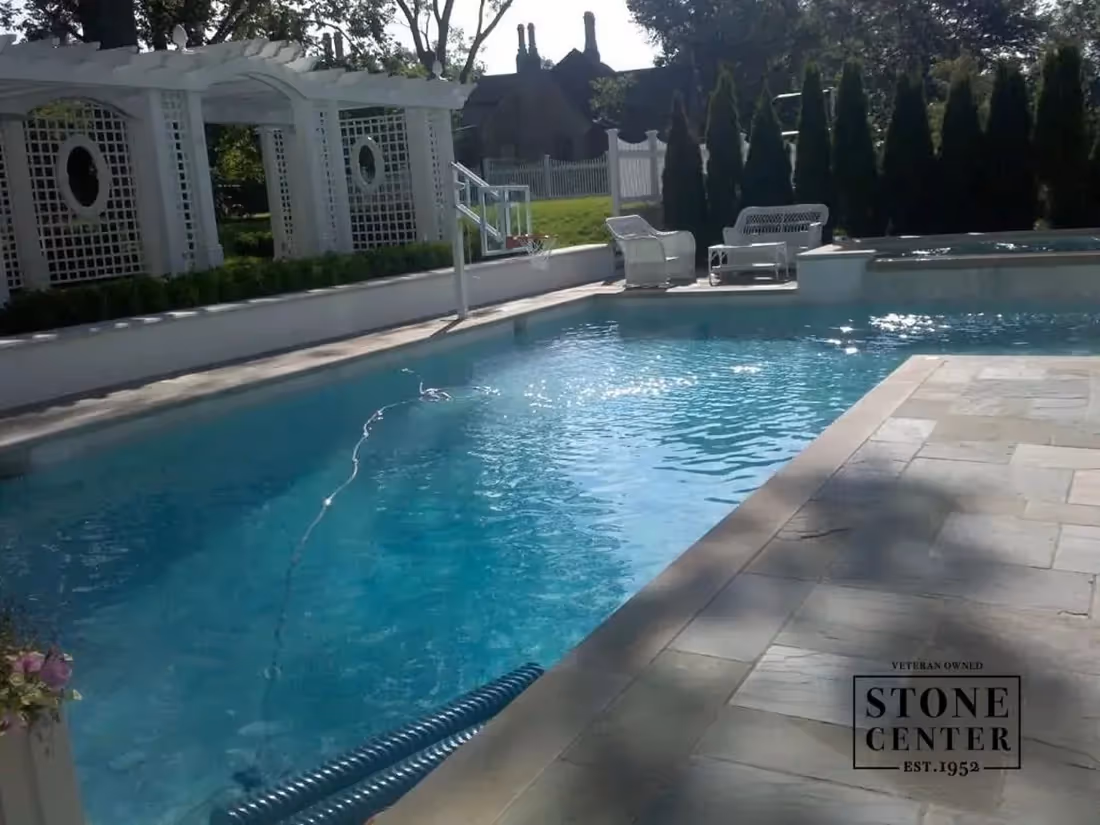 stone pavers around swimming pool