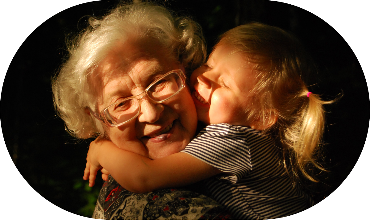 Grand mom and her young grand daughter, hugging