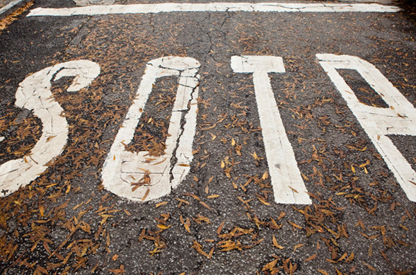 A stop road sign spent wrong