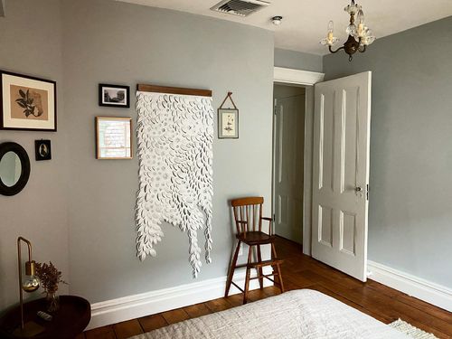 "Seeing Stars Scroll (wild edge)", 2021, hand-cut Tyvek, walnut hanger, 60” x 24” x 2”