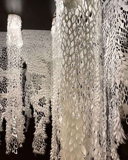 "Unsaid" (detail), One Commerce Square, 2020, site-specific installation, hand-cut Tyvek, embroidery hoops, hidden speakers, 9’ x 12’ x 10’