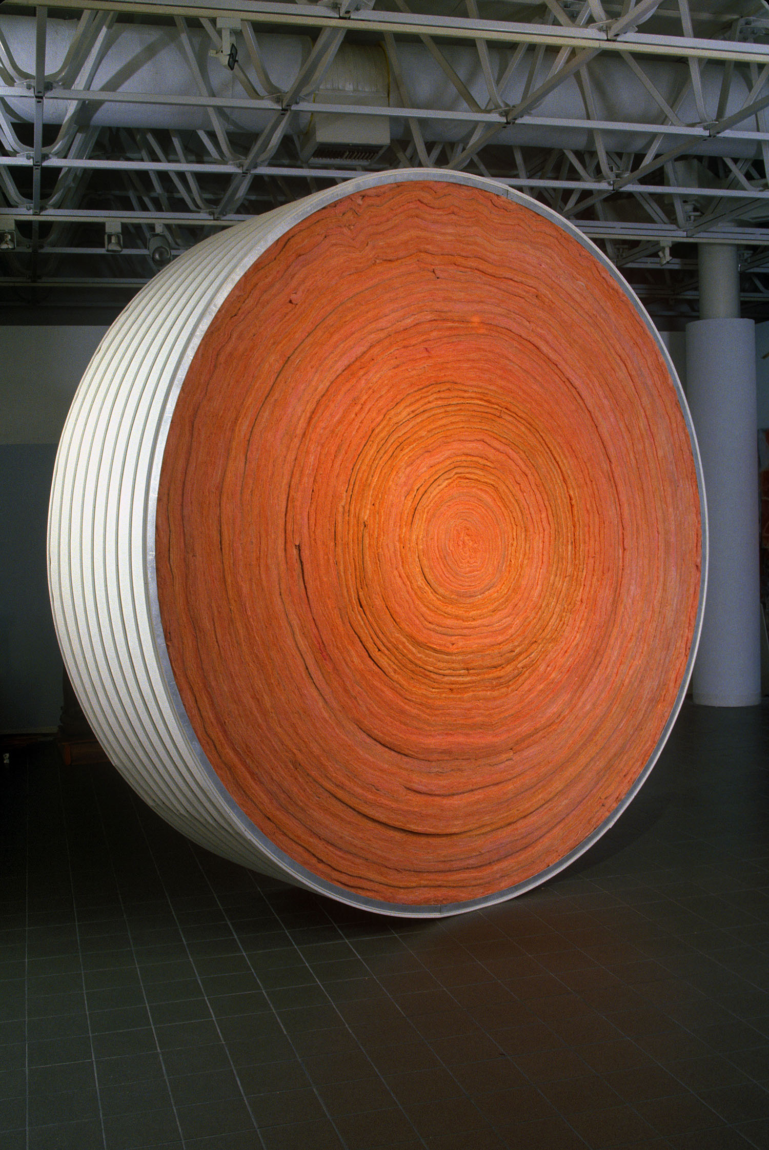 "For the People" pink insulation, vinyl siding, 13’ diameter x 30” wide