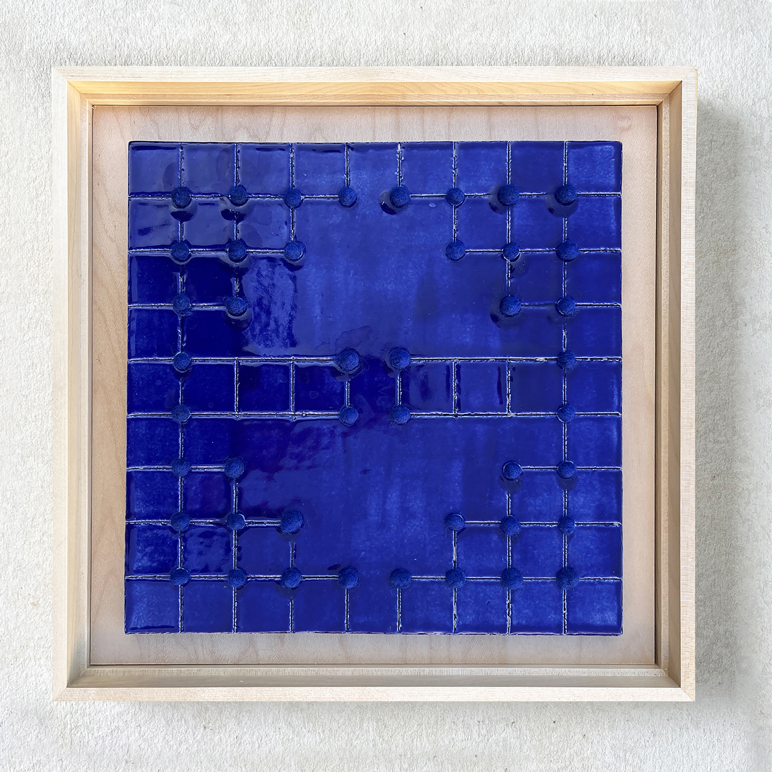 “Devotions_17” Ceramic Wall Sculpture, Glazed stoneware clay, Corriedale wool, 9.5” x 9.5” x 3/8” (12”x12” framed)