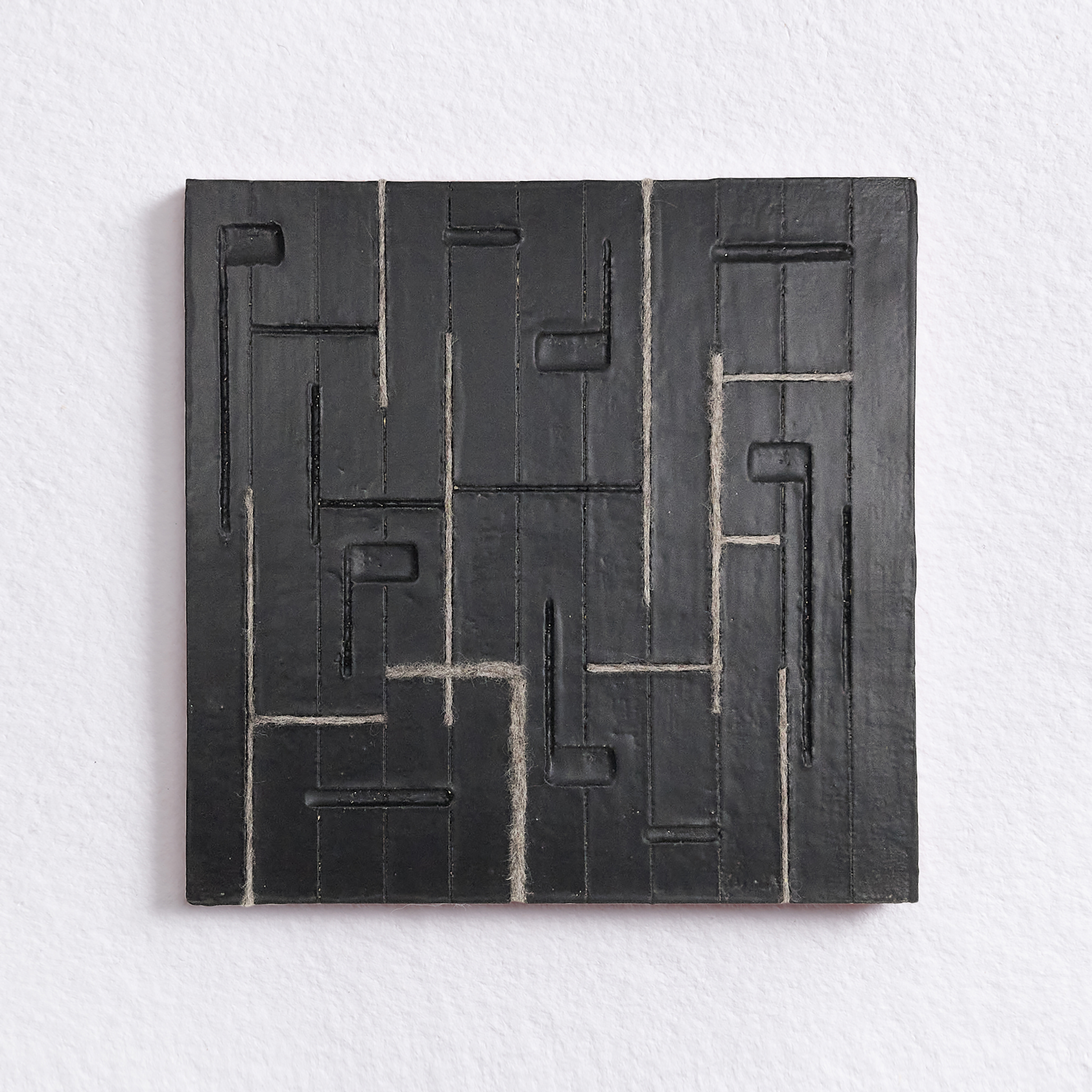 “Traces No.2” Ceramic Wall Sculpture, Glazed stoneware clay, Corriedale wool, 10.5” x 10.5” x 1/2”