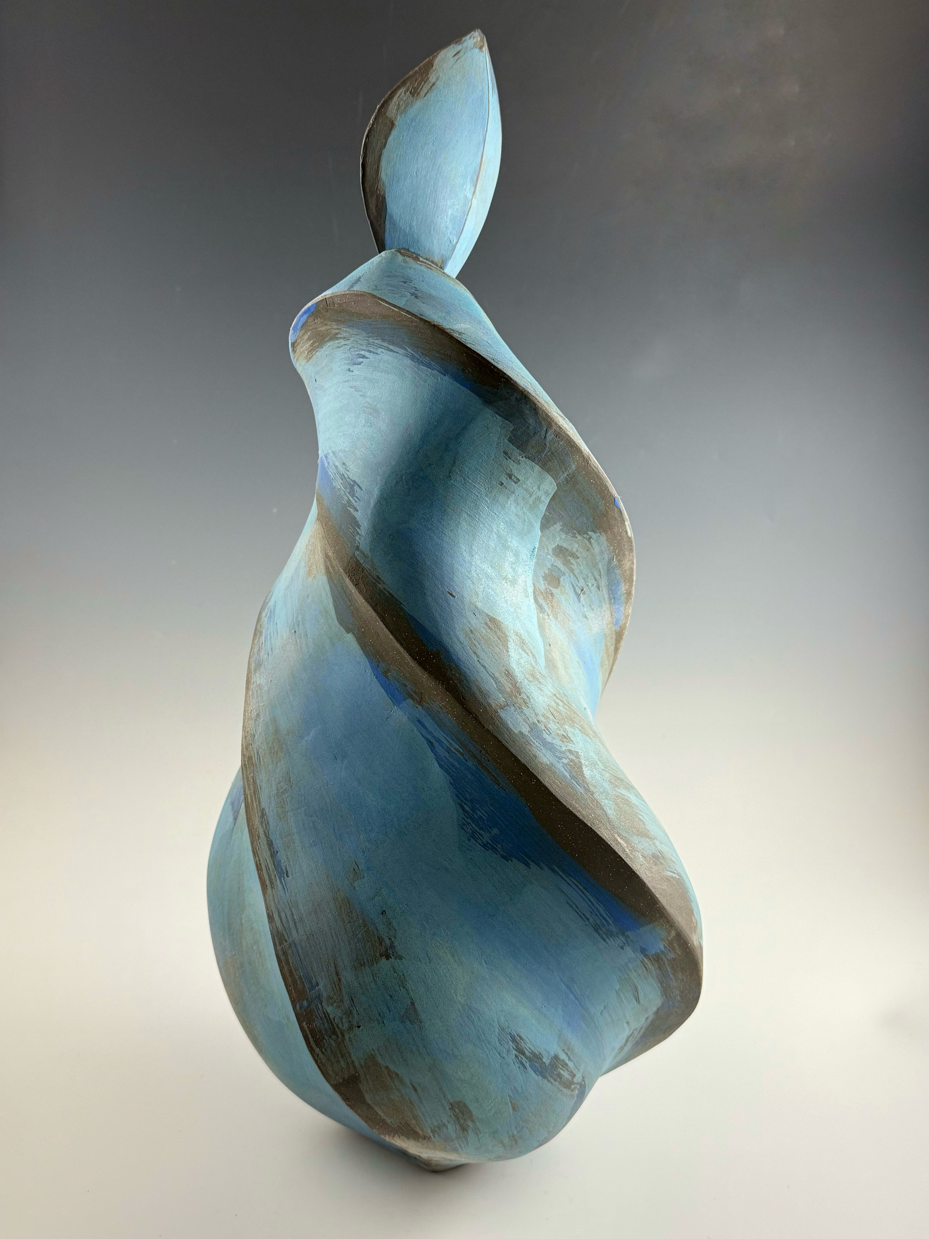 Blue Twisted Bottle, 2025, Ceramic: Brown Stoneware, glaze, underglaze, 21 x 11 x 13