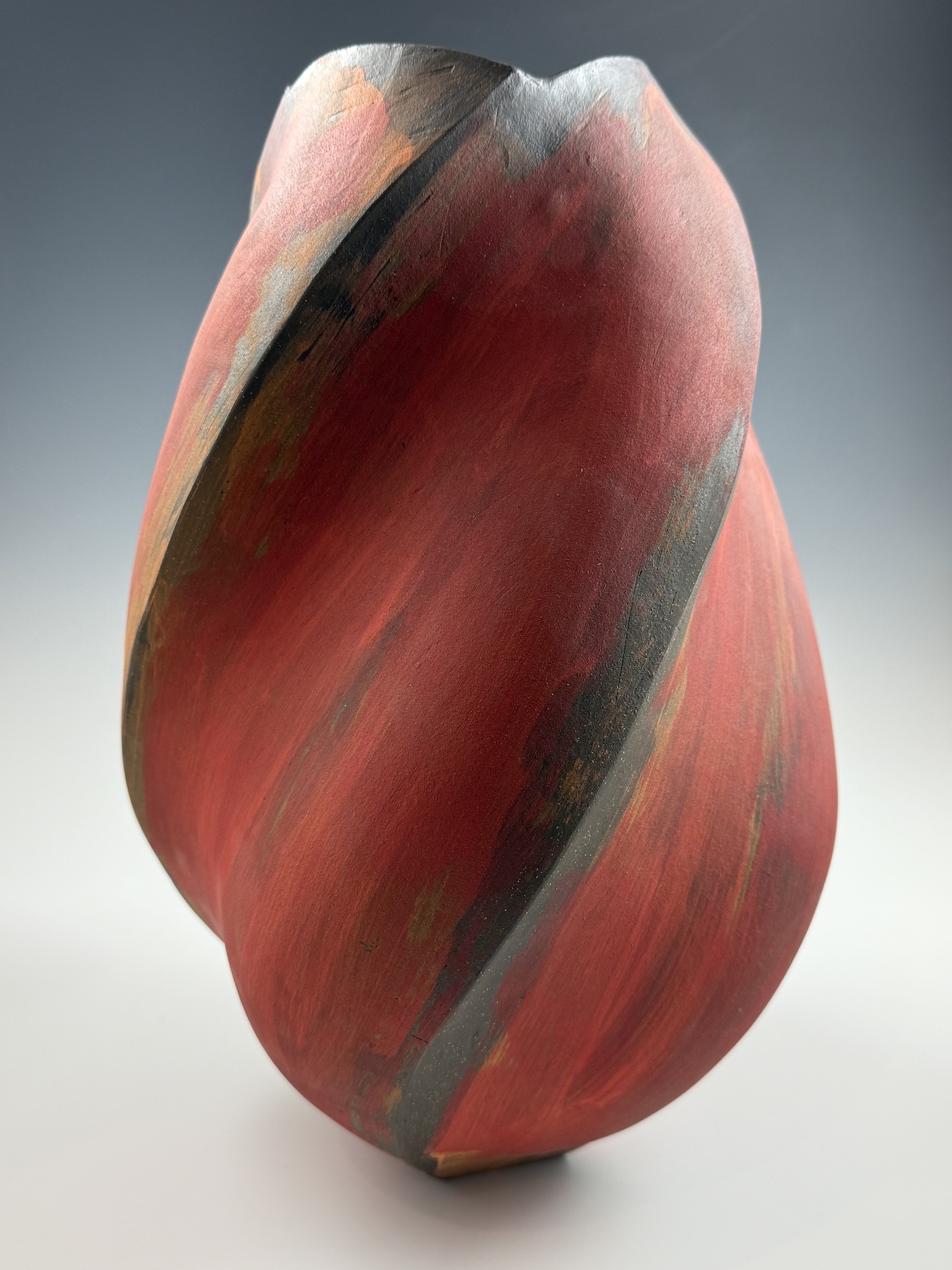 Large Wide Red Twisted, 2025, Ceramic: brown stoneware, glaze, underglaze, 18 x 12 x 12