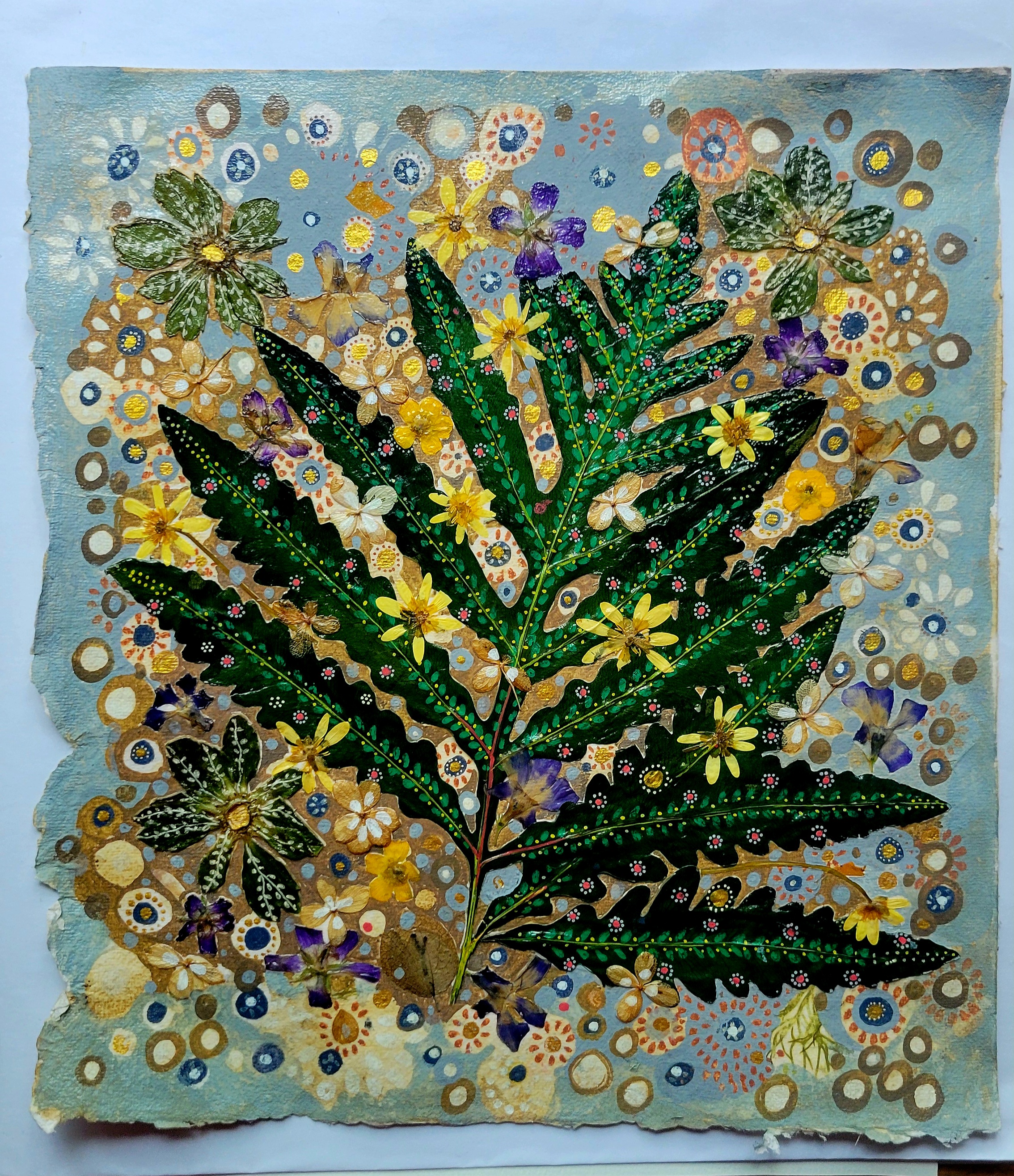 “Fraternal twins” 2025, Pressed leaf, wild flowers and paint pens, 10” x 12”