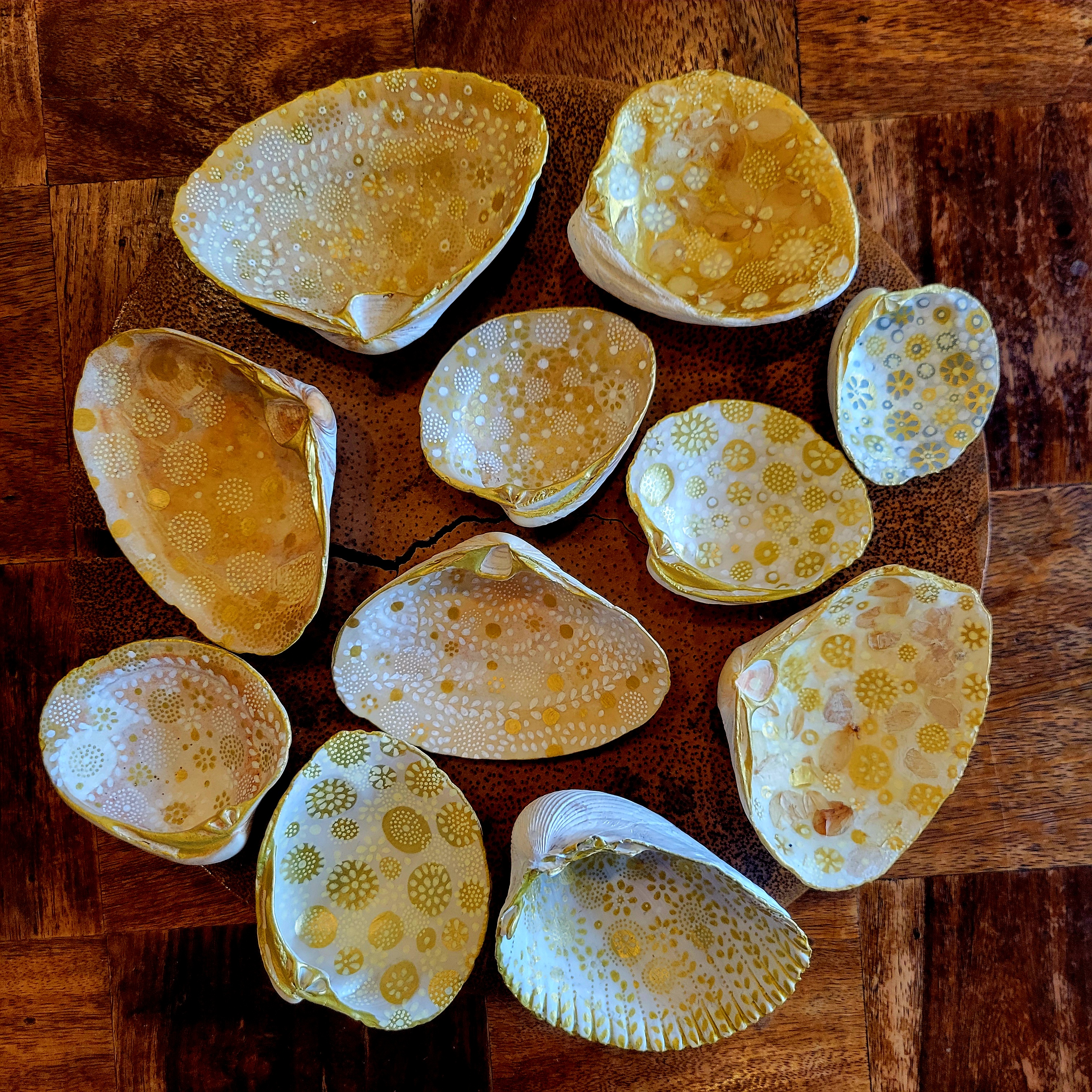 “Natural gold” 2025, Clam shells and paint pens Maple leaf, paint pens and resin, 3” x 3” x 1”