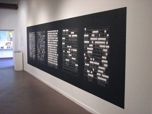 Marking Language,  2007, marking tags, map pins, chalk, chalkboard paint, installation, 7 x 25 feet (approx.)