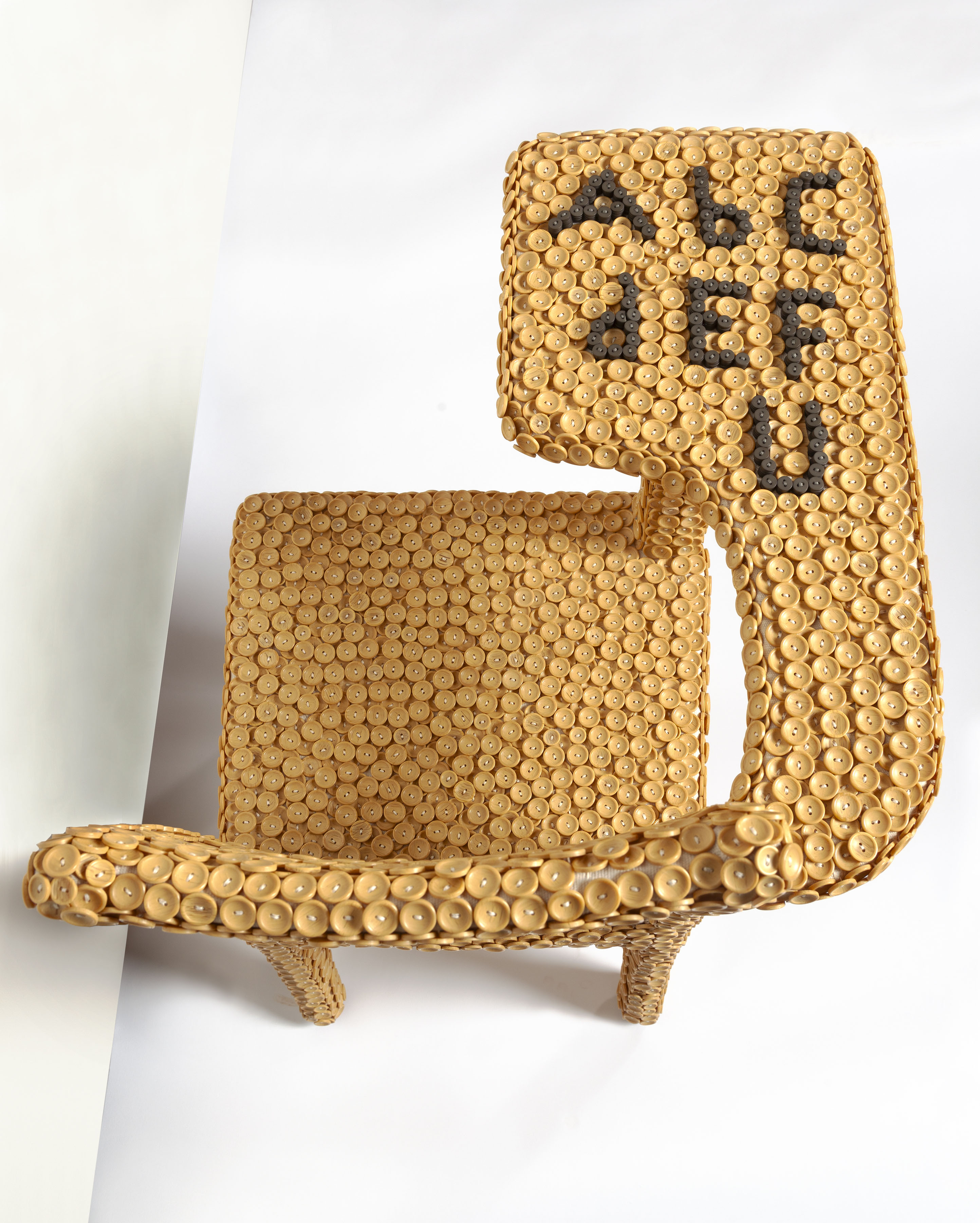 ABCDEFU, 2016, sculpture, polywood and plastic clothing buttons, embroidery thread, cotton fabric, wood chair, rulers, yardsticks, 34 x 22.5 x 24 in. (chair), 72 x 72 in (crosshair). DETAIL VIEW