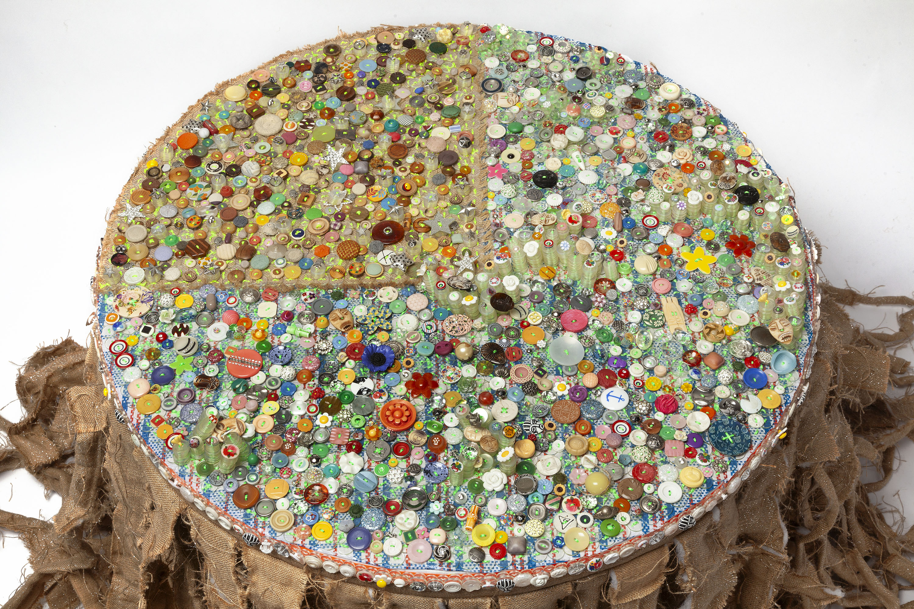 The Conversation, 2017-2023, sculpture, assorted clothing buttons (cloth, metal, bone, et al.), embroidery thread, burlap, plastic bags, 34 x 36 in. diameter (table) total dimensions variable DETAIL VIEW
