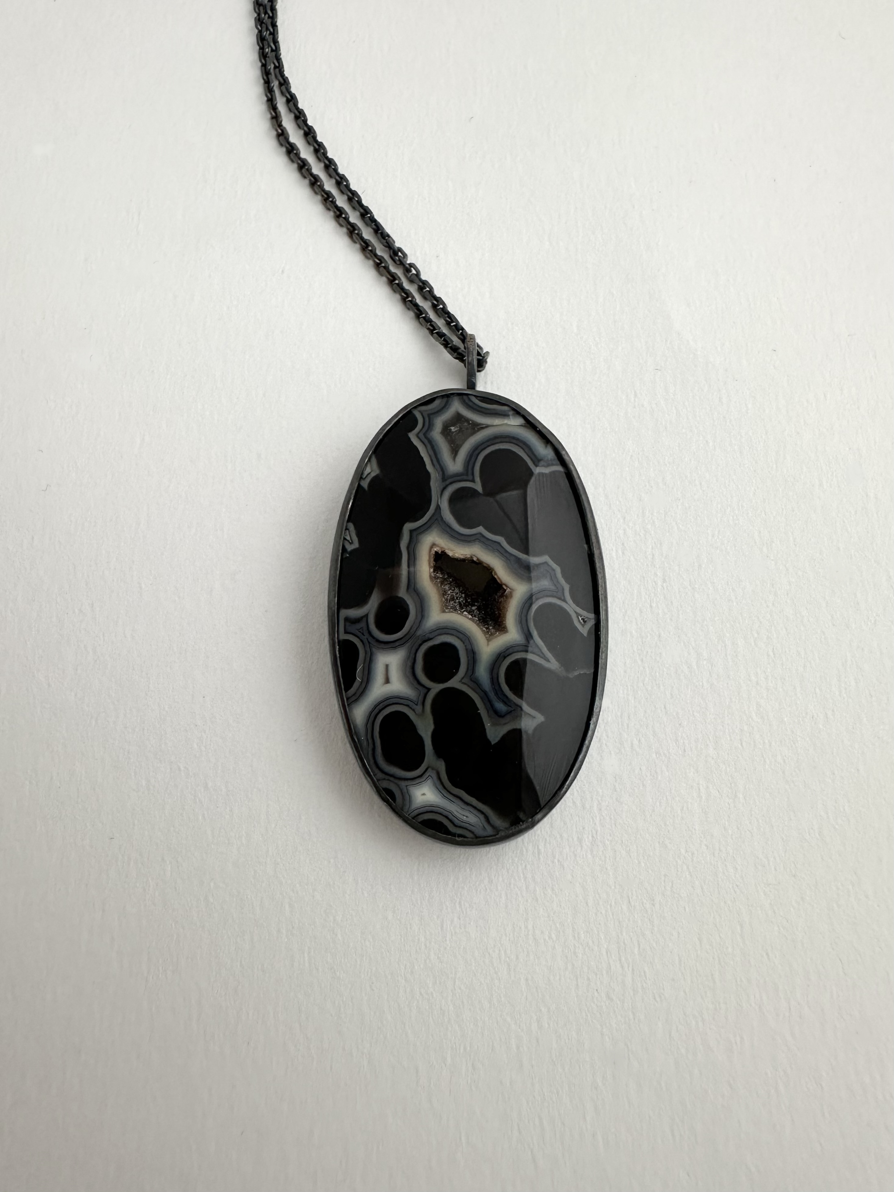 Black Plume Necklace, 2025 | Oxidized sterling silver, black orbicular plume agate; 1 ⅞ inches, 30 inches oxidized sterling silver elongated box chain
