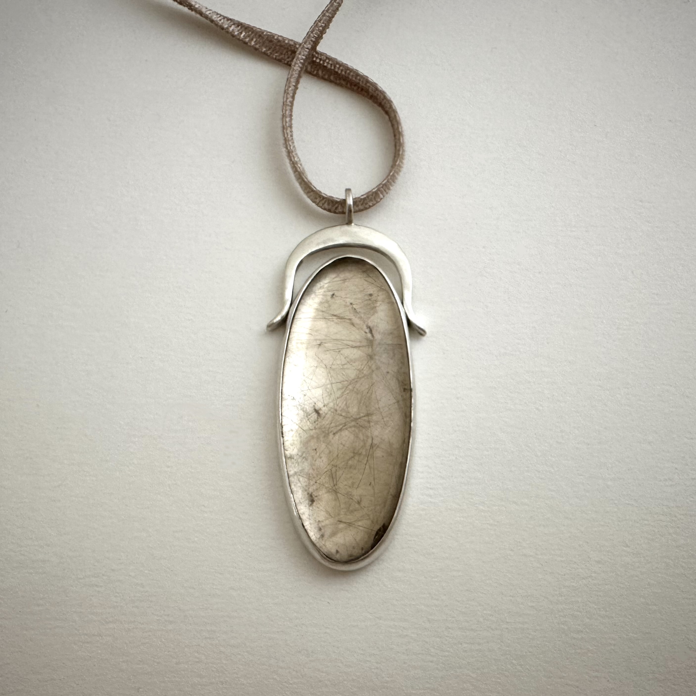 Rutilated Quartz Necklace, 2026 | Fabricated sterling silver, rutilated quartz, Japanese rayon velvet; 2 x ¾ inch pendant, variable length