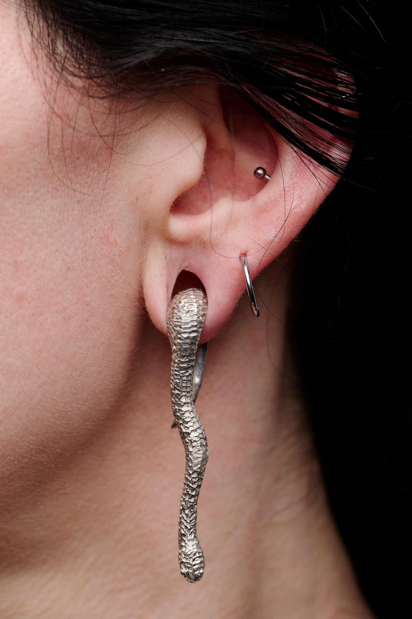 Snake Weight Earrings, 2025, Sterling Silver, weights for stretched ears, on model
