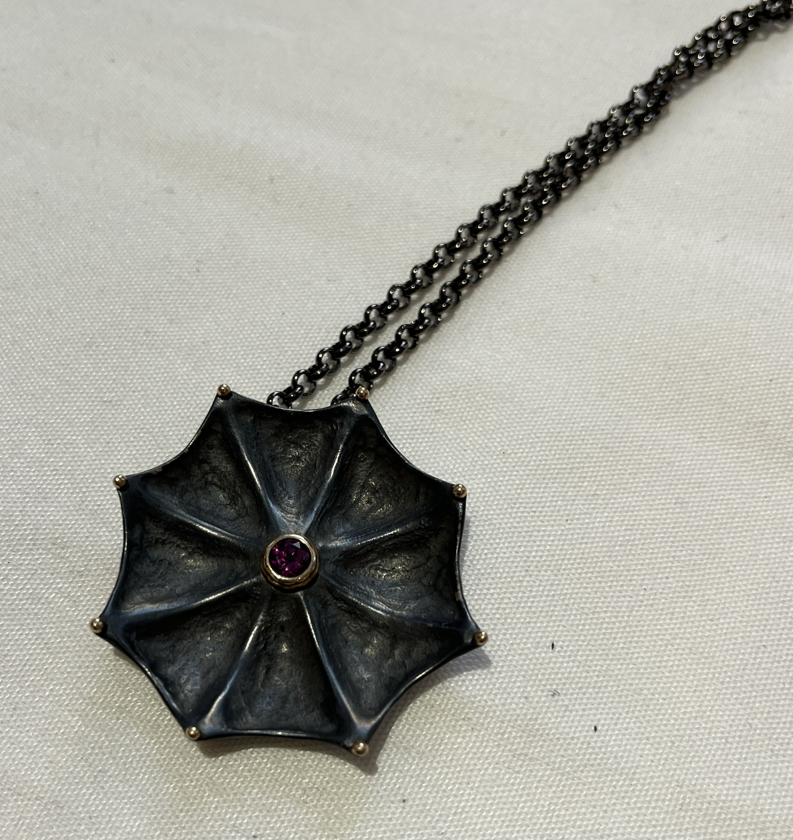 Webbed Necklace, Oxidized sterling silver, 14k gold bezel and garnet