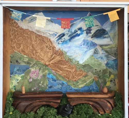 "May You Be Peaceful" mixed media: wood, moss, collage, wax, rice paper, paint, 18" x 18" x 4”