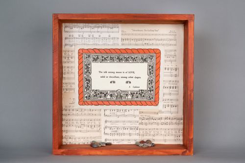 "The Talk Among Stones" mixed media: wooden box, sheet music, stones, repurposed, 18" x 18" x 4”