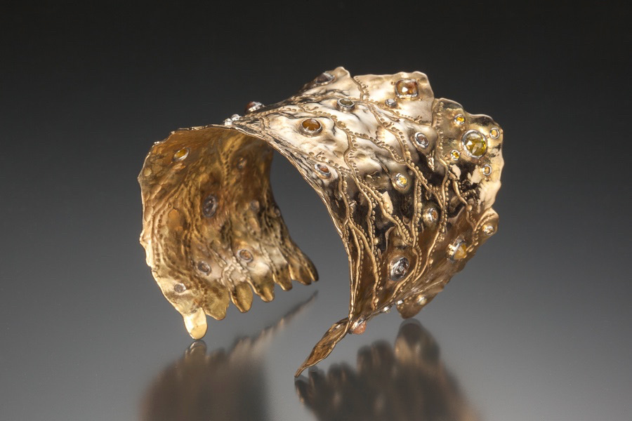 Untitled Cuff: Hand forged 18k gold and platinum cuff set with 29 rose cut rough diamonds.