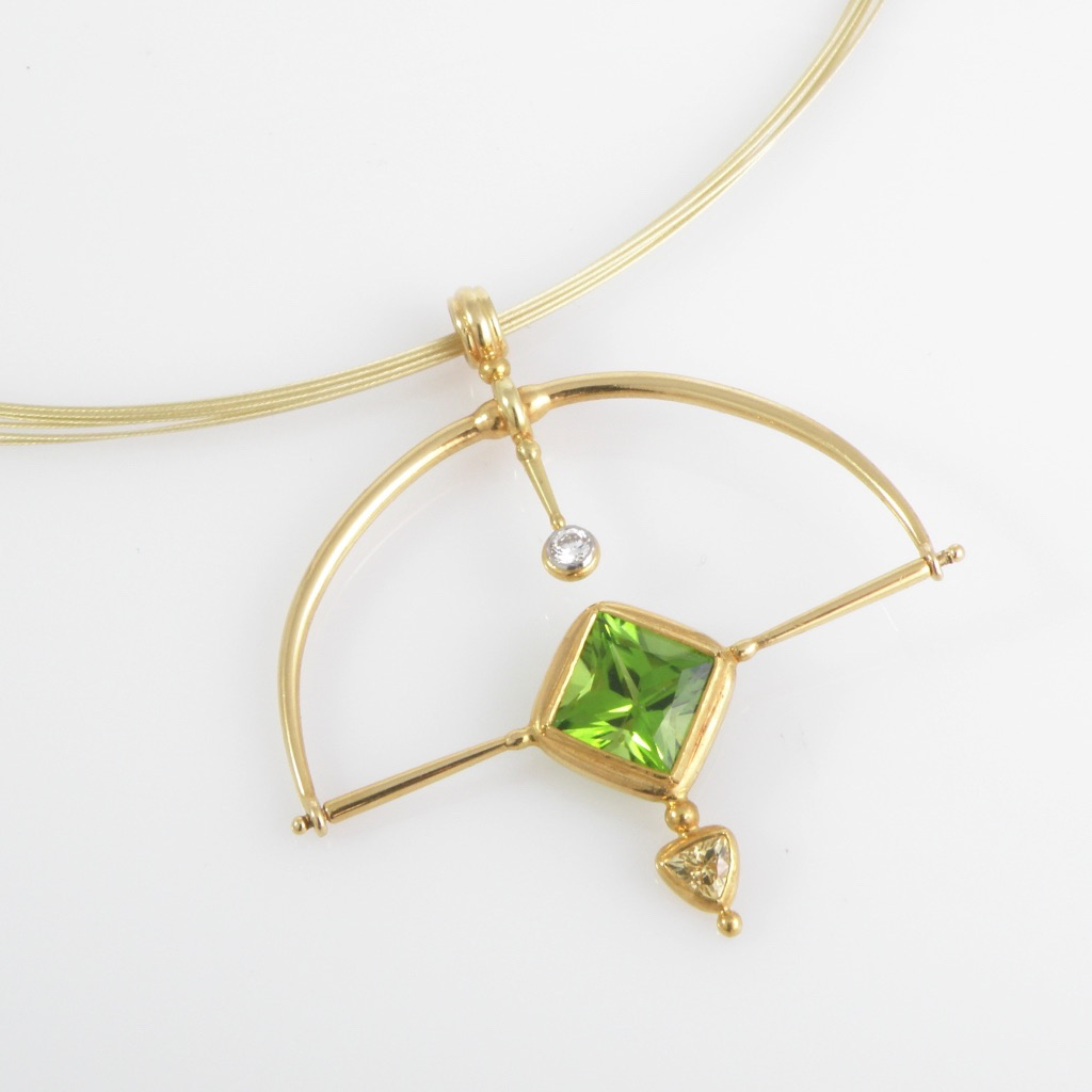 Untitled Pendant: Hand forged 18k gold pendant set with Peridot, sapphire and white diamond.