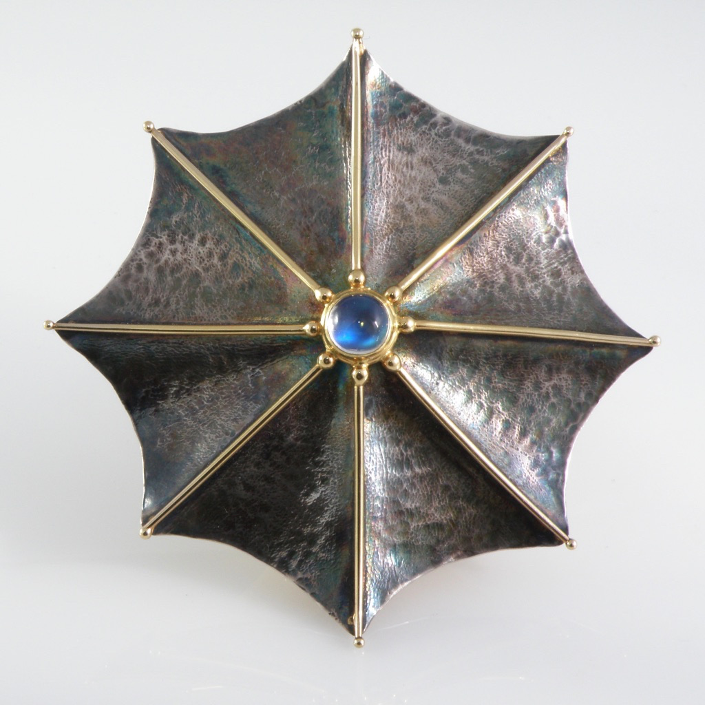 Untitled Pin/Pendant: Hand forged 18k gold and oxidized sterling silver pin/pendant set with blue moonstone.