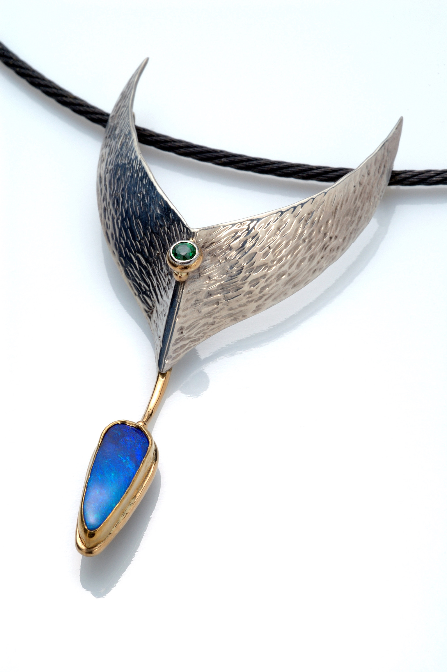 Untitled Necklace: Hand forged 14k gold and sterling silver necklace set with Australian boulder opal and tsavorite tourmaline.