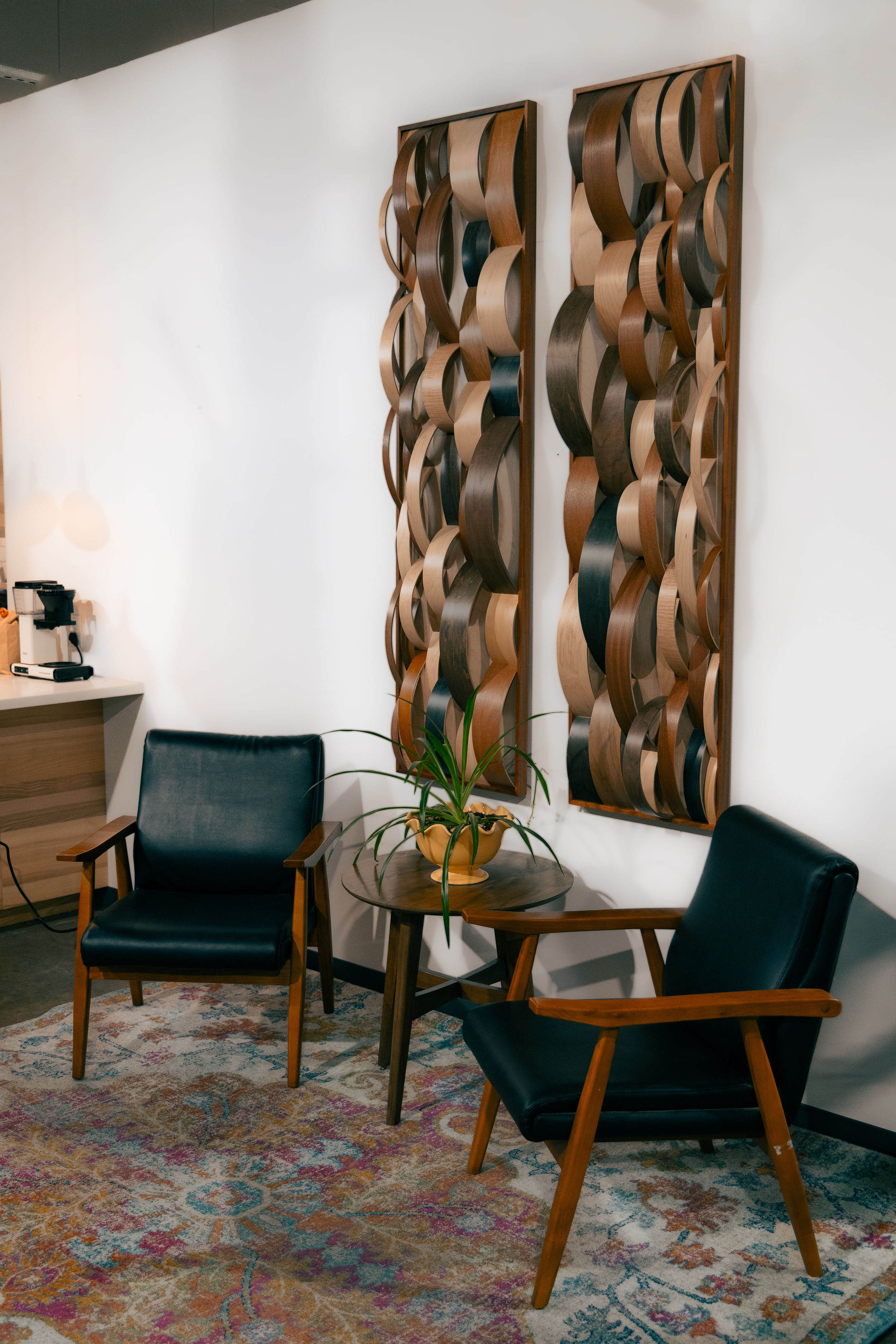 "Parallel Living Room Set" 2023, wood drum shell fragments, mahogany frame, 72” x 18” (x2)