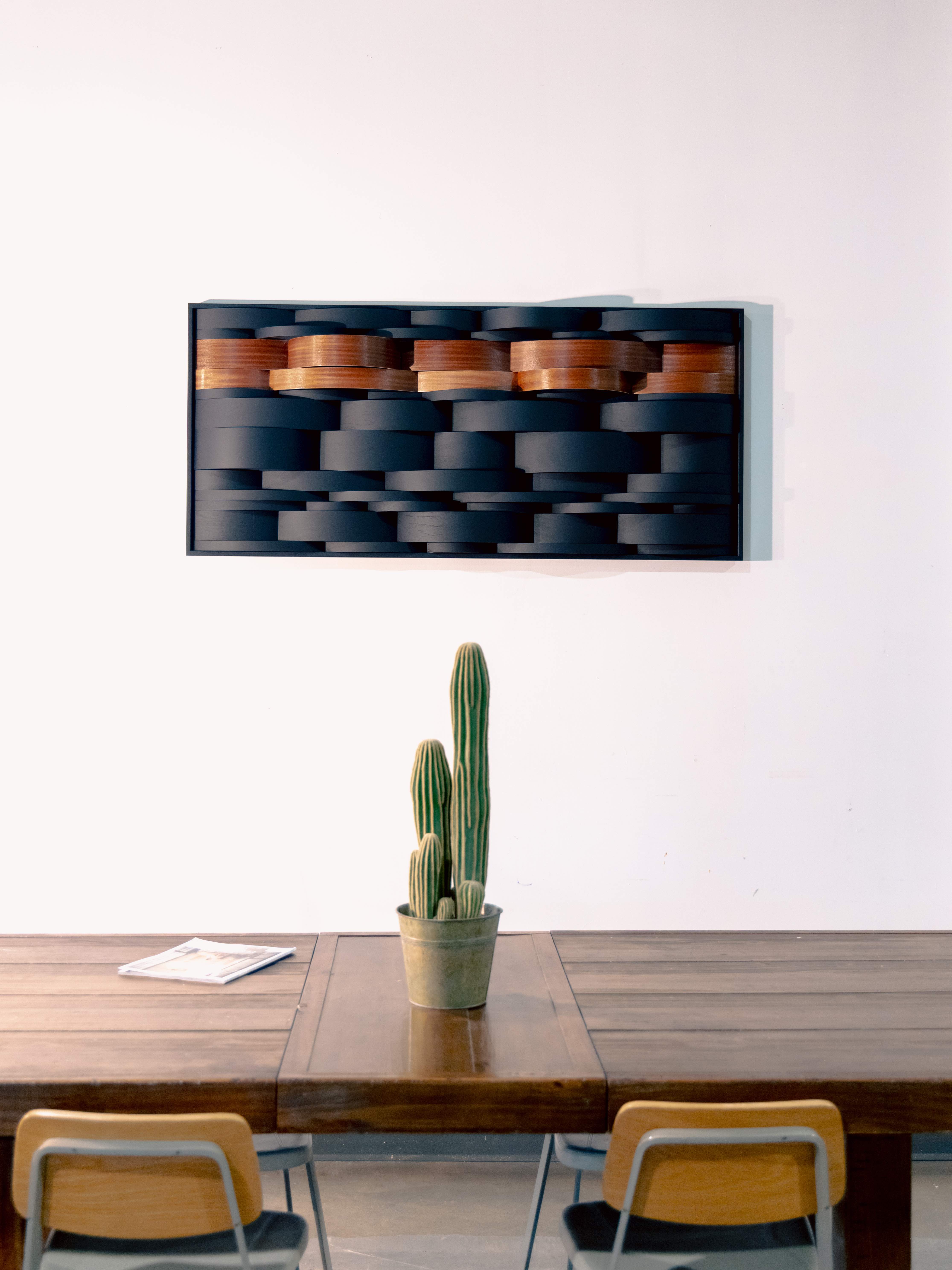 “ember” 2026, acrylic paint, ribbon mahogany drum shells, 55” x 25”